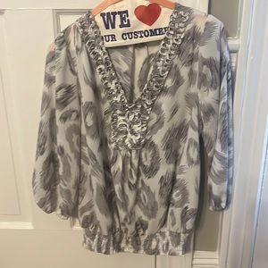Grey and white v-neck blouse